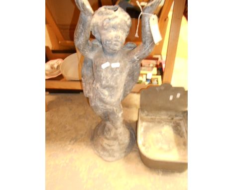 An early 20th C lead figure of a cherub A/F and a lead planter 