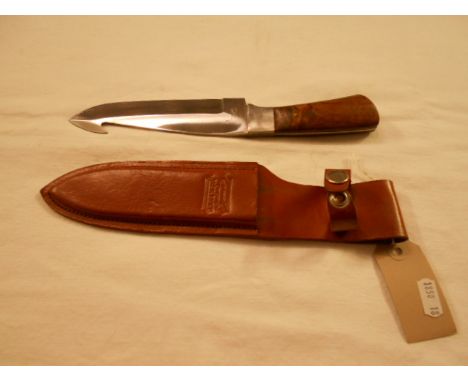 A modern Jack Pike hunting knife complete with scabbard