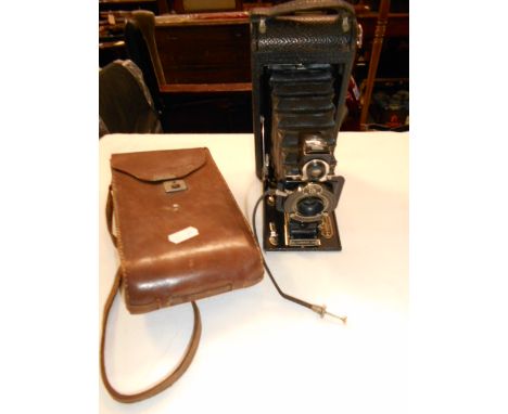 An early 20th century Eastman Kodak NO.1A Junior bellows camera, complete with leather case.