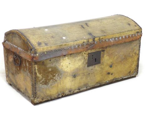 A Georgian hide covered trunk with domed top, metal lock plate, 86.5 by 41 by 43.5 cm high. 