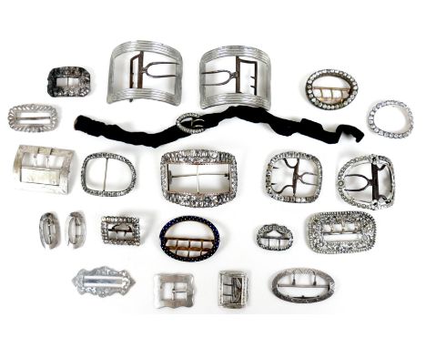 A group of Georgian and later buckles, many paste set, including one large pair, one small pair, and the rest singles, one bl