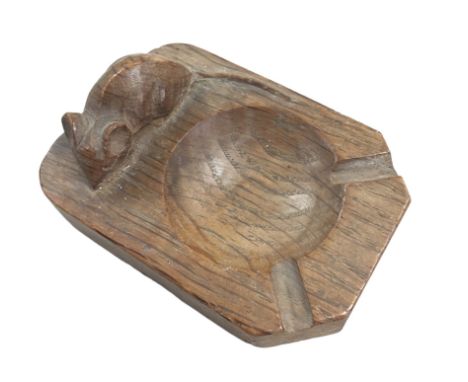 Robert 'Mouseman' Thompson of Kilburn (British, 1876-1955): an English oak ashtray, with carved mouse signature, 10.3 by 7.4 