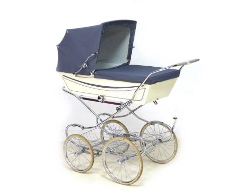 A vintage Marmet coach built pram, with blue hood/apron and attachable sun canopy, blue floral interior against a white groun