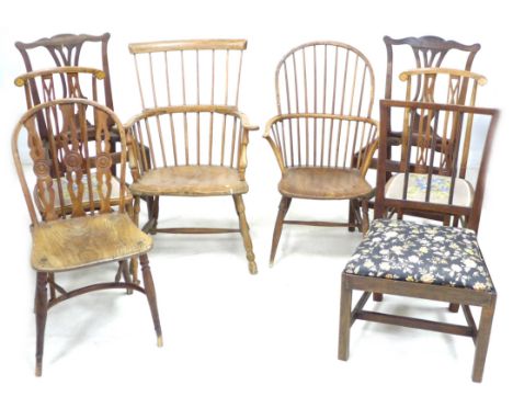 A group of six chairs, including two Windsor armchairs, and a Lancashire comb back chair, 59 by 65 by 98 cm high. (6) 