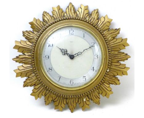 A vintage Smiths Sectric sunburst form wall clock. 