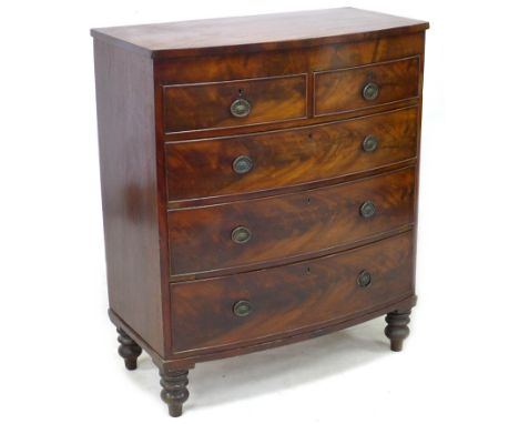 A Regency mahogany bow front chest, of two short over three long drawers, raised on bracket feet, 101.5 by 53.5 by 120 cm hig