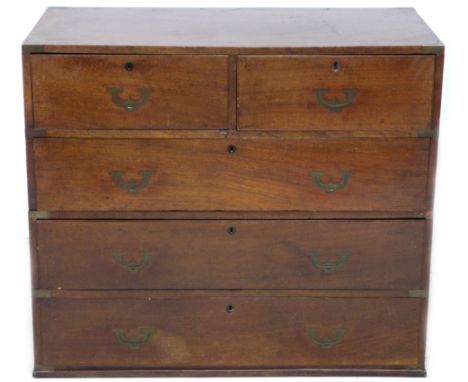 An early Victorian mahogany campaign chest of two short over three long drawers, flush campaign brass ring handles and brass 