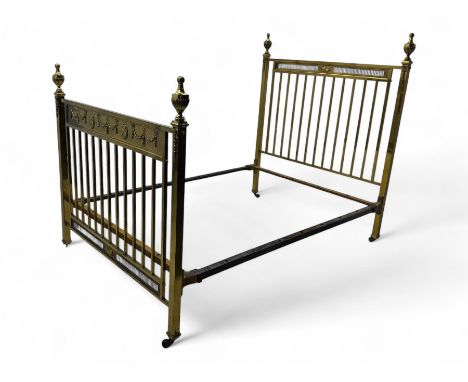 Edwardian Adam Revival brass 4' 6'' double bedstead, decorated with gadroon urn finals and applied bell flower garlandsCondit