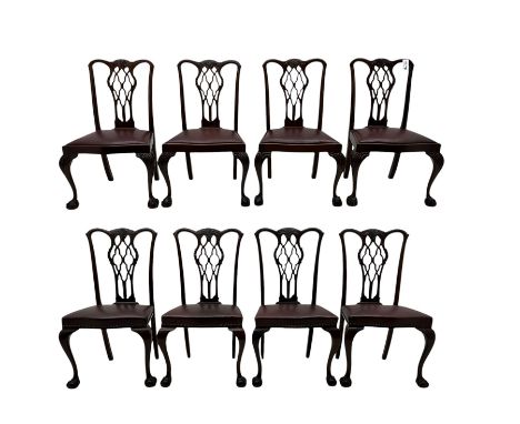 Mixed set of eight early 20th century Chippendale design dining chairs, shaped cresting rail carved with central foliate moti
