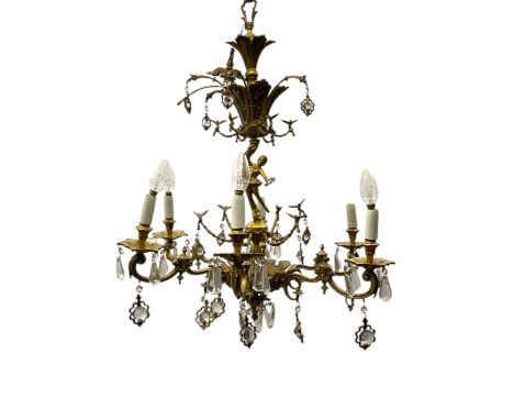 Gilt metal six branch ceiling light, the central stem modelled as a ballerina, decorated with glass pendants Dimensions: Heig