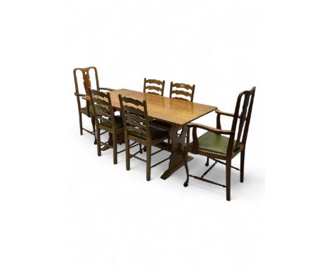 20th century light oak refectory dining table, rectangular top on shaped and pierced end supports, united by pegged stretcher