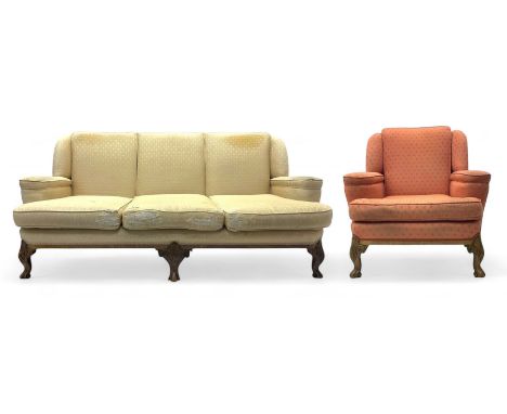 Late 20th century mahogany framed three seat sofa, upholstered in cream fabric with repeating cross pattern, raised on cabrio