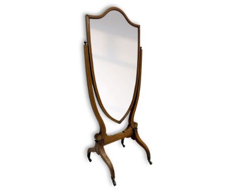 S. & H. Jewell - Edwardian mahogany cheval dressing mirror, shield shaped bevel edged mirror plate within an inlaid mahogany 