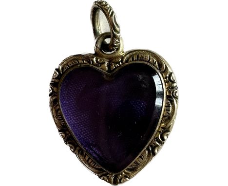 Vintage heart shaped yellow metal locket 