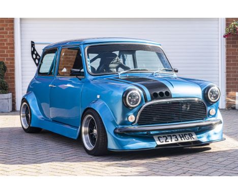 An incredible Mini Custom with around £30,000 spent on its creation. Sometimes words are never enough.Painted in BMW Long Bea