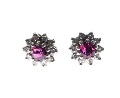 Pair of unmarked white metal, ruby and diamond ear studs (lacking keepers), 3.2g gross approx  