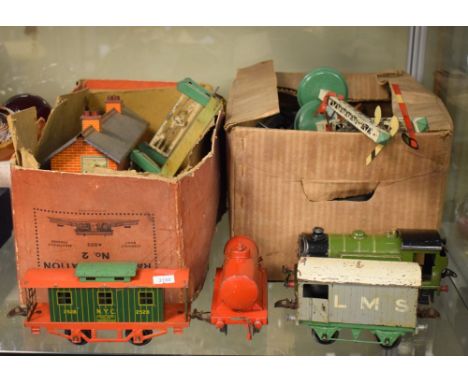 Quantity of vintage Hornby tin trackside buildings, wagons and accessories  