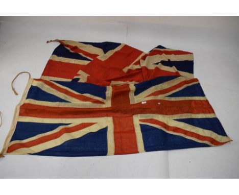 Two Union flags, the first 173cm x 82cm, the second a larger printed similar (2)