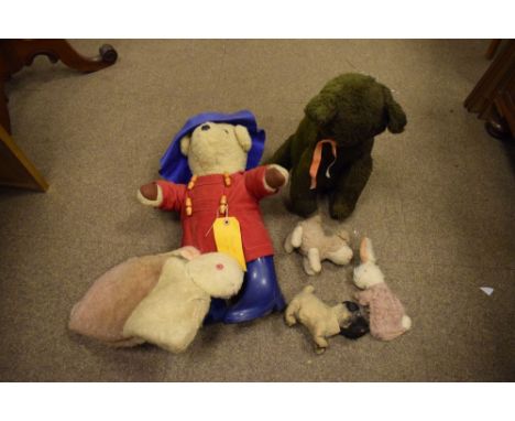 Small group of soft toys to include Paddington Bear, vintage Pug dog, cat etc  