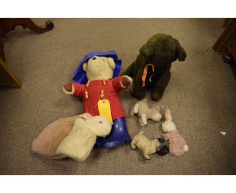 Small group of soft toys to include Paddington Bear, vintage Pug dog, cat etc  