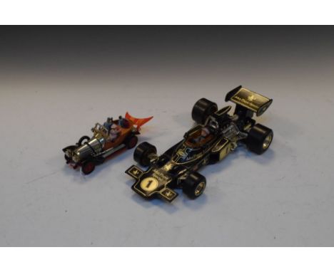 Two vintage Corgi die-cast model vehicles comprising Chitty Chitty Bang Bang and John Player Special F1 Racing Car, both unbo