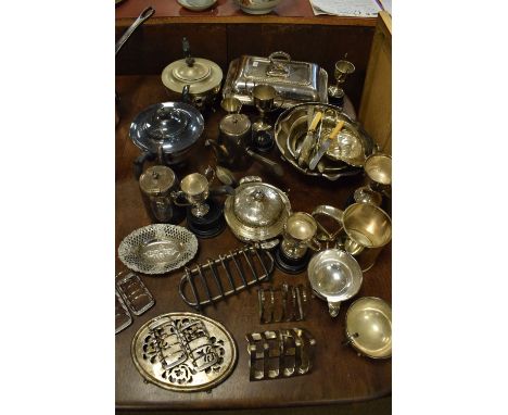 Large selection of silver plated wares to include; toast racks, chocolate pot, entrée or vegetable dish and cover, etc  