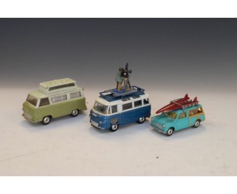 Three vintage Corgi Toys die-cast model vehicles comprising Austin Mini Countryman, Commerbus 2500 Series with cameraman to t