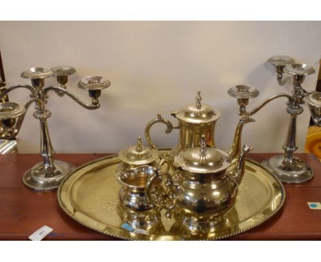 Assorted silver plated wares to include; pair of four-branch candelabra and four piece tea set  