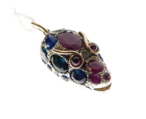 Unusual unmarked yellow metal pendant in the form of a snake or serpent head with ruby, sapphire and diamond mounts, 9.2g gro