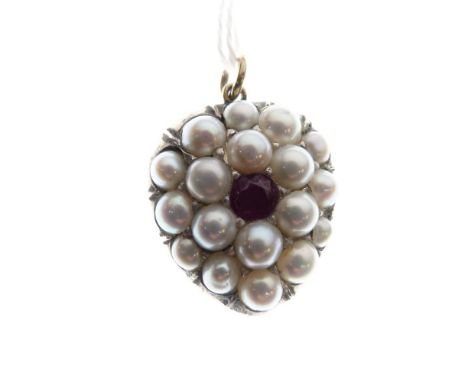 Unmarked yellow metal, pearl and ruby-set heart pendant with central ruby and eighteen pearls, 9.1g gross approx  