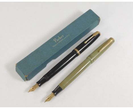 PARKER. A black Parker Duofold fountain pen with 14ct. Phillips Oxford nib &amp; a Parker Victory fountain pen. Sold together