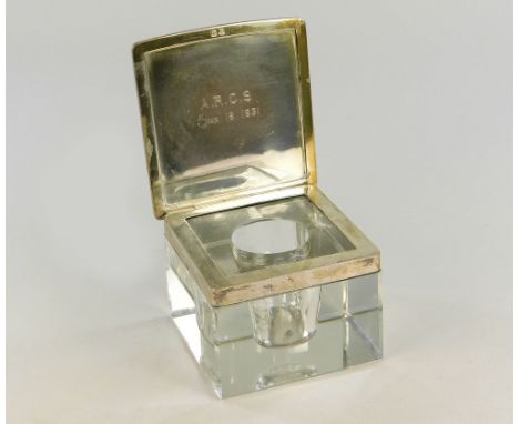 INKWELL.A heavy cut glass silver mounted inkwell with engine turned lid. Birmingham 1930. 8 x 8.5cm.