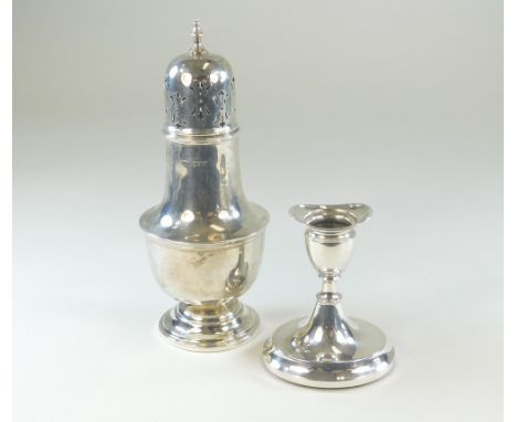 CASTER ETC. A silver sugar caster, Sheffield 1924, height 19cm. Also, a small French silver dwarf candlestick, 8.5cm.