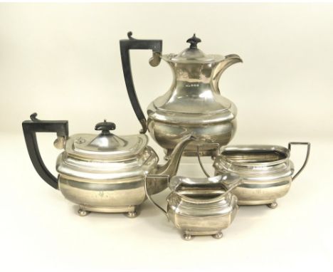 TEA SERVICE. An Art Deco four piece tea service, each piece monogrammed "M". Birmingham 1927. Full height of coffee pot 22cm.