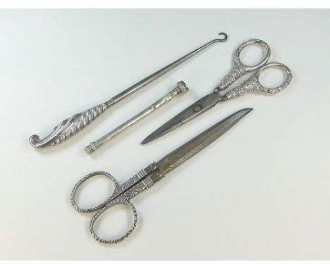 SCISSORS ETC.A pair of silver mounted needlework scissors, one other pair of scissors, a silver mounted button hook & a penci