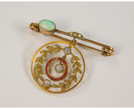 OPAL PIN. A 9ct. gold opal &amp; seed pearl pin, hung a red enamelled &amp; opal pendant drop.