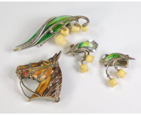 MARCASITE.A marcasite & cold painted enamel horse head brooch & a marcasite cold enamel & bone Lily of the Valley brooch & ea