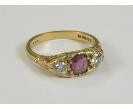 GOLD RING. An 18ct. gold Victorian style ruby &amp; diamond ring. (K)