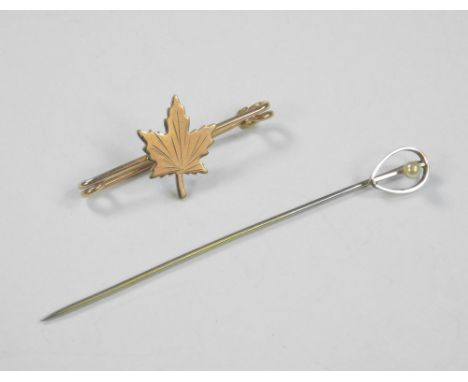 CANADIAN PIN ETC. A Canadian maple leaf pin &amp; a stick pin, both in Toronto retailer's boxes.