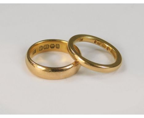 WEDDING BANDS. Two 22ct. gold wedding bands (K &amp; I). Approx. 11.3g.