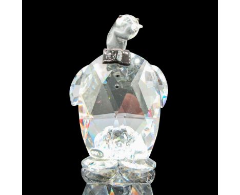 Faceted clear body, smooth head and neck. Black button eyes, bowtie and buttons, Zoo impressed mark. Issued: 20th centuryDime