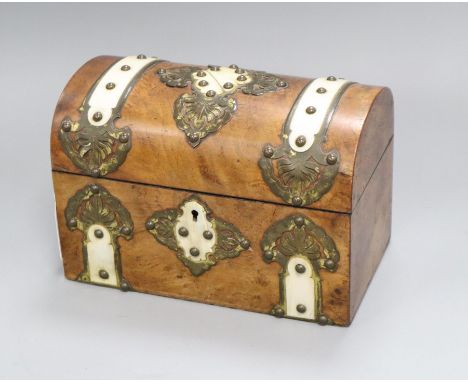 A Victorian walnut domed topped brass mounted tea caddy length 23cm