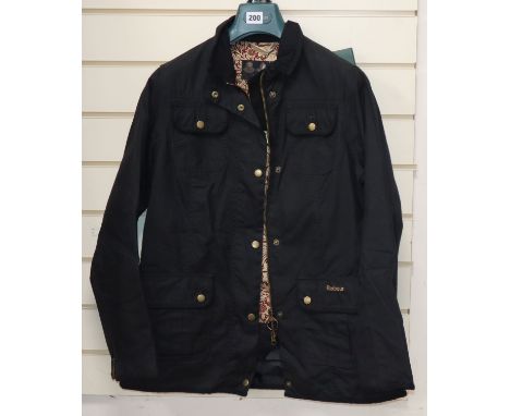 A new ladies Barbour black wax jacket with William Morris print lining, size 14