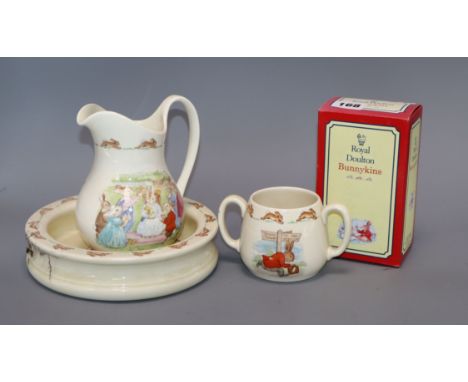 A Bunnykins bowl jug and two handled mug together with twelve Bunnykins characters including: Clean Sweep, Sun Dial, The East