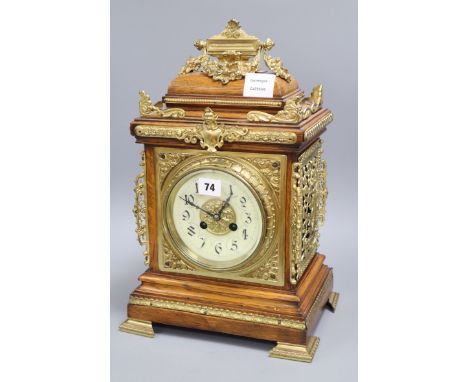 A late 19th century French cast brass mounted rosewood eight day mantel clock height 43cm