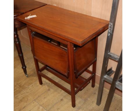 An Edwardian walnut card table, fitted side folding tiers W.70cm