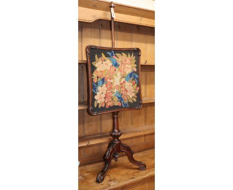 A Victorian mahogany adjustable tripod pole screen with tapestry banner