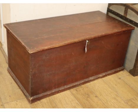A Victorian pine trunk with painted grain W.110cm