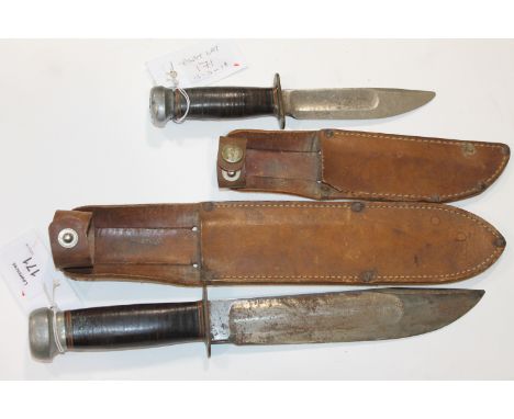 A MARBLES BOWIE KNIFE. A large bladed Bowie Knife, with hollow ground wide fuller, of 7.3/4" length. The name Marbles, Gladst