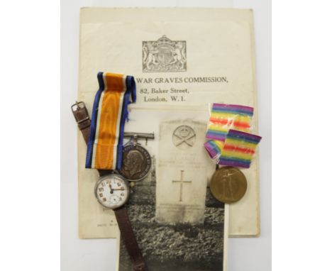 AN M G CORPS CASUALTY PAIR &amp; PRESENTATION WATCH 1917. British War &amp; Victory medals named to 102653 Pte H R Meager MGC